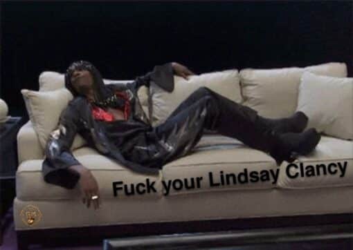 Chappelle Show Memes, Current Event Memes, Dark Humor, Dave Chappelle Memes, Fuck You Memes, Funniest Memes, Homicide Memes, Lindsay Clancy, News Memes, NSFW, Offensive Memes, Rick James Memes, Tragedy Memes, A man dressed in a flashy black outfit lounges dramatically across a pale couch in a dimly lit room, posed with exaggerated confidence and disrespect. The bold black caption, “Fuck your Lindsay Clancy,” is angled across the lower part of the couch, turning the whole image into a blunt, confrontational punchline.