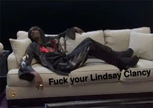 Chappelle Show Memes, Current Event Memes, Dark Humor, Dave Chappelle Memes, Fuck You Memes, Funniest Memes, Homicide Memes, Lindsay Clancy, News Memes, NSFW, Offensive Memes, Rick James Memes, Tragedy Memes, A man dressed in a flashy black outfit lounges dramatically across a pale couch in a dimly lit room, posed with exaggerated confidence and disrespect. The bold black caption, “Fuck your Lindsay Clancy,” is angled across the lower part of the couch, turning the whole image into a blunt, confrontational punchline.