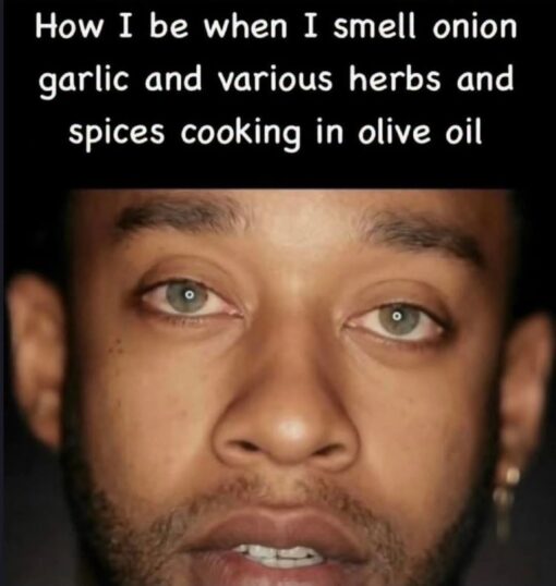 Cooking Memes, Food Memes, Funniest Memes, Happiness Memes, Mood Memes, Smelly Memes, Stink Memes, A black-background meme places large white text above an extreme close-up of a man’s face. His eyes are half-open and glazed, his mouth slightly parted, and his expression looks blissed-out, dazed, and hypnotized, as if he has just been spiritually transported by a smell. The caption reads: “How I be when I smell onion garlic and various herbs and spices cooking in olive oil,” turning the face into a dramatic reaction shot for the moment aromatics hit hot oil in a kitchen.