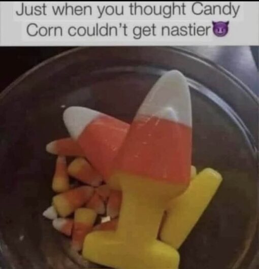 Food Memes, Funniest Memes, Gross Memes, Halloween Memes, Nasty Memes, Snack Memes, Weird Memes, WTF Memes, The meme shows a close-up of a bowl containing regular candy corn pieces alongside a much larger, glossy candy-corn-colored object. It has the familiar white, orange, and yellow layers, but its oversized, awkward shape makes it look less like a seasonal treat and more like a strange, vaguely suggestive candy creation.