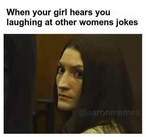 Angry Memes, Conversation Memes, Couple Memes, Crazy Girlfriend Memes, Dating Memes, Funniest Memes, Girlfriend Memes, Jealousy Memes, Lindsay Clancy, Men vs Women, Relationship Memes, Trust Issues Memes, Women Memes, The meme shows a young woman with long dark hair turning her head to give a sharp, suspicious side-eye. Her expression is serious and slightly intimidating, as if she has just noticed something she does not like and is silently judging the person off-camera.