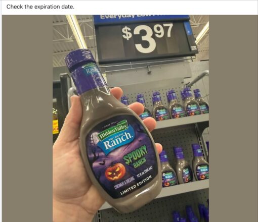 Food Memes, Funniest Memes, Grocery Memes, Gross Memes, Halloween Memes, Shopping Memes, Spooky Memes, Walmart Memes, Weird Memes, WTF Memes, A shopper holds up a bottle of Hidden Valley “Spooky Ranch” dressing in a store aisle, with more identical bottles lined up on the shelf behind it. The bottle has Halloween-themed packaging with a purple night sky, bats, bare trees, and a glowing jack-o’-lantern, while the dressing inside appears an unsettling grayish-brown instead of the familiar creamy white ranch color. Above the shelf is a large “Everyday Low” price sign showing $3.97, and the caption at the top reads, “Check the expiration date.” The humor comes from the product looking less like a festive limited-edition condiment and more like ranch that has gone horribly bad.