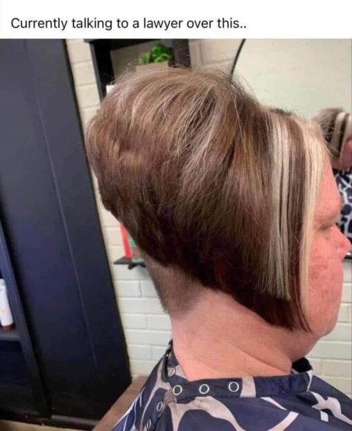 Bad Day Memes, Barber Memes, Cringe Memes, Funniest Memes, Hair Memes, Law Memes, Regret Memes, WTF Memes, The meme shows a close-up side view of someone sitting in a salon chair after a disastrously uneven haircut. The hair is shaped into a strange, bulky bowl-like mound at the back, with an abrupt shaved undercut and long straight pieces hanging down near the face, creating a look that feels unfinished, accidental, and very hard to explain to anyone walking by. Across the top, the caption reads, “Currently talking to a lawyer over this..” The plain text sits above the image like a casual social media post, making the botched hairstyle look so severe that the person jokingly treats it as a legal matter rather than just a bad haircut.
