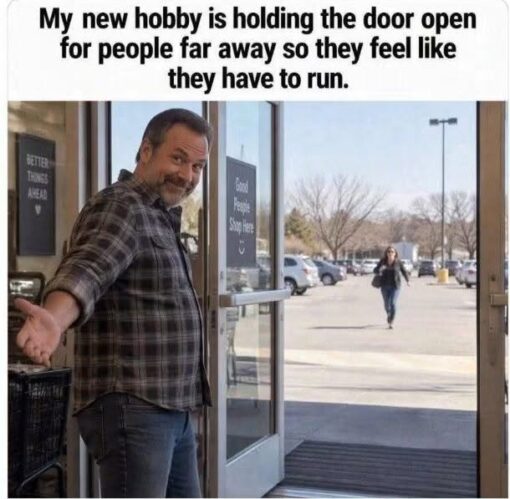 Annoying People Memes, Awkward Memes, Funniest Memes, Funny Sign Memes, Gentleman Memes, Jerk Memes, People Memes, Practical Joke Memes, Prank Memes, Rude Memes, Running Memes, Social Memes, Troll Memes, The meme shows a man standing inside a glass doorway, holding the door open with an exaggeratedly polite posture and a mischievous smile. Outside, across the sidewalk and parking lot area, a person is hurrying toward the entrance as if pressured to make it before the door-holder gives up. The scene includes wholesome-looking signs on or near the doorway, including “BETTER THINGS AHEAD” and “Good People Stop Here :).” Those upbeat messages make the man’s behavior look even more deceptively kind, because the caption reveals he is turning a small courtesy into a social trap.
