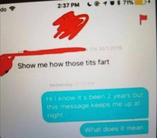 Boob Memes, Confused Memes, Cringe Memes, Dirty Text Memes, Fart Memes, Funniest Memes, Funny Text Memes, Horny Memes, Misunderstanding Memes, NSFW, Weird Memes, WTF Memes, A blurry photo of a phone screen shows an old text-message exchange, with names or identifying details scribbled over in red. At the top, one person has sent the baffling line, “Show me how those tits fart,” and below it, two years later, the recipient replies in blue bubbles asking for clarification because the phrase has apparently haunted them ever since. The image has the raw look of a screenshot repost: washed-out colors, visible phone status bar, and heavy red censor marks, which makes the absurdity of the message feel even more like a real, embarrassing artifact from someone’s inbox.
