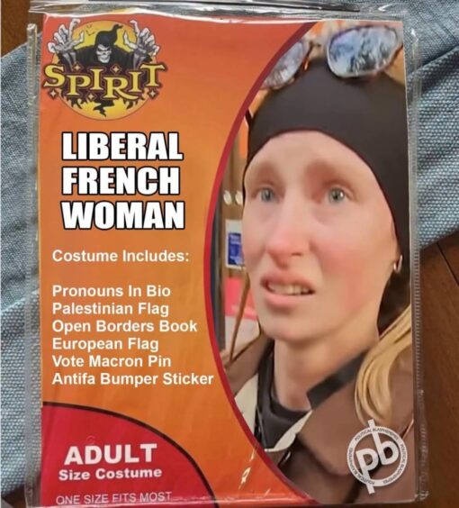 Activist Memes, Costume Memes, Free Palestine Memes, Funniest Memes, Halloween Memes, Immigration Memes, Israel vs Palestine Memes, Leftist Memes, Liberal vs Conservative Memes, Political Memes, Pronoun Memes, Protestor Memes, Women Memes, The image is styled like a plastic-wrapped Spirit Halloween costume package, with an orange retail-card background and a fake product title in big white block letters: “LIBERAL FRENCH WOMAN.” On the right is a close-up photo of a blonde woman wearing a dark head covering and goggles on top, edited into the oval display area where a costume model would normally appear.