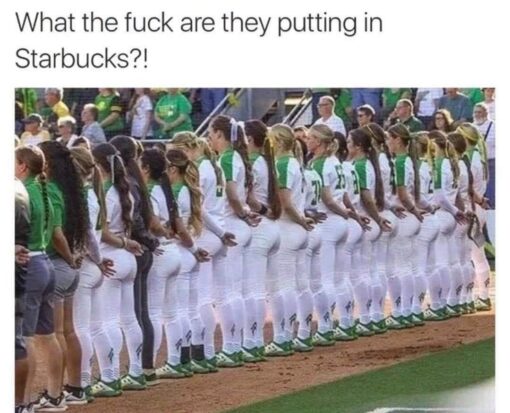 Booty Memes, Coffee Memes, Dirty Mind Memes, Funniest Memes, NSFW, Sports Memes, Women Memes, WTF Memes, The meme shows a lineup of women’s softball players standing side by side on a field, dressed in matching white-and-green uniforms and green cleats. Above the photo, large black text reads, “What the fuck are they putting in Starbucks?!”