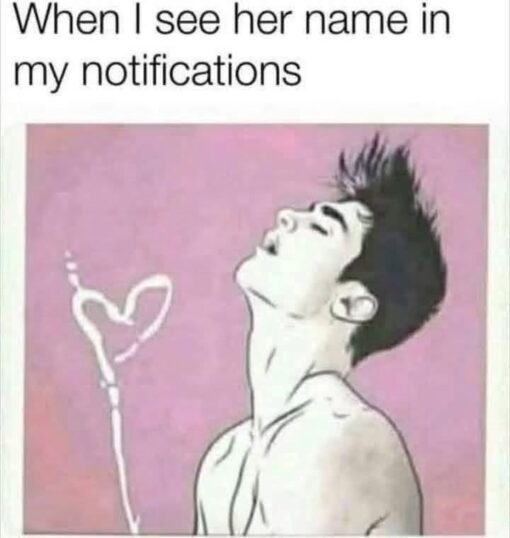 Anime Memes, Flirting Memes, Funniest Memes, Funny Text Memes, Girlfriend Memes, Happiness Memes, Love Memes, Mood Memes, Phone Memes, Relationship Memes, Social Media Memes, The meme shows a simple, slightly grainy image macro with the caption “When I see her name in my notifications” above a romanticized black-and-white drawing of a shirtless anime-style young man. He tilts his head back dramatically, eyes closed and mouth open, while a white heart shape floats near him against a soft pink background. The whole image has an exaggerated lovestruck vibe: the pose looks theatrical, almost like he is overwhelmed by emotion, and the heart makes the romantic reaction unmistakable.